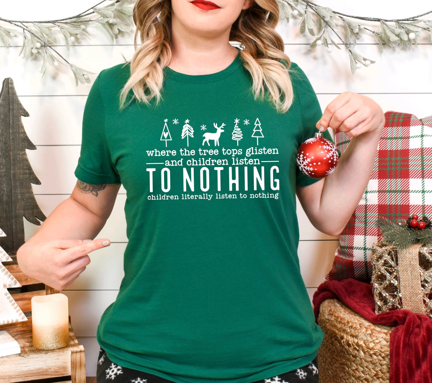 Where the tree tops glisten and children listen to nothing children literally listen to nothing- unisex t-shirt in green