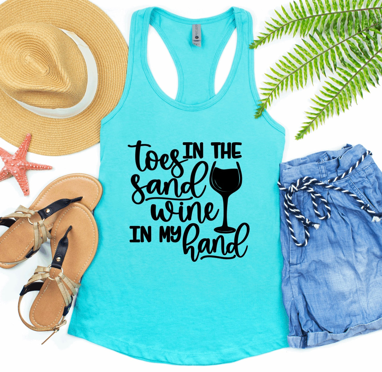 Toes in the sand wine in my hand racerback tank top