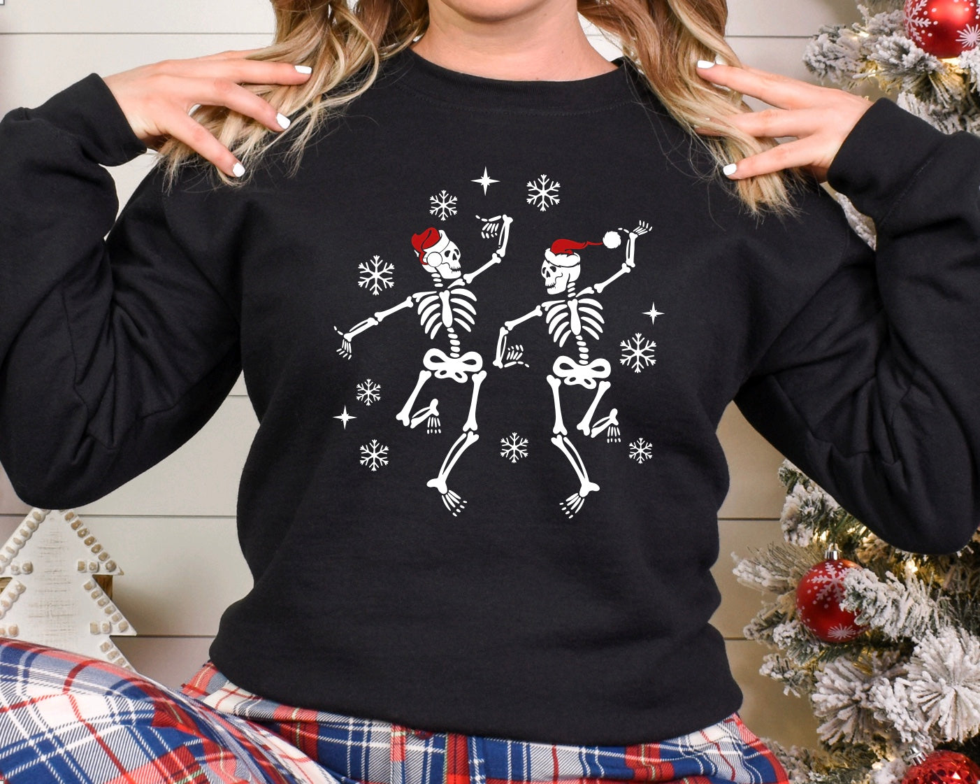 Dancing skeletons with Santa hats Christmas unisex crewneck sweatshirt in black