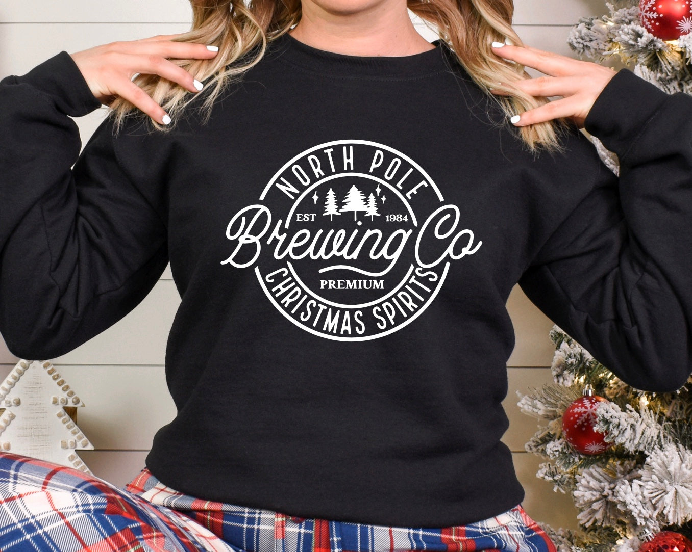North Pole brewing co Christmas unisex crewneck sweatshirt in black