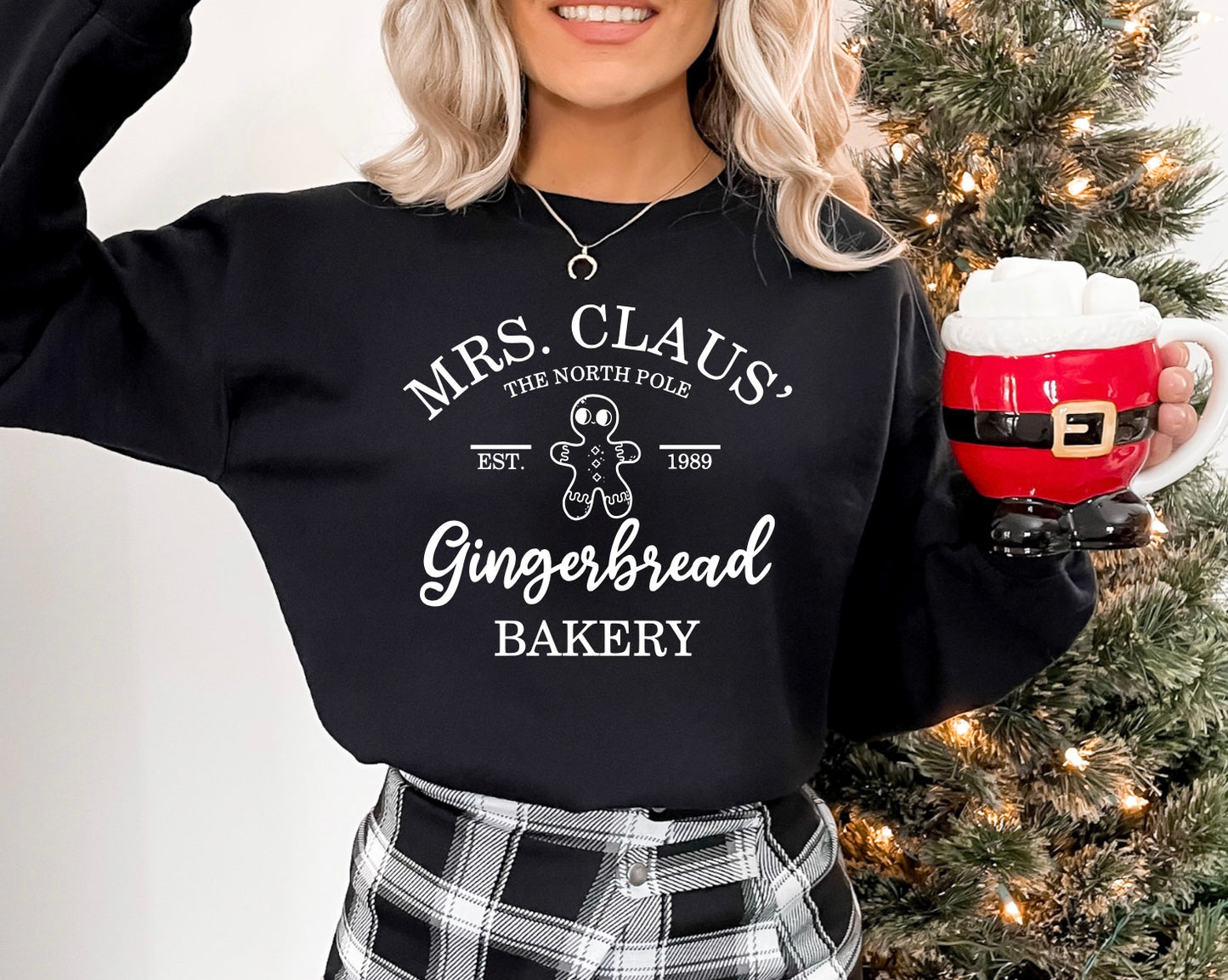 Mrs. Claus' gingerbread bakery unisex crewneck sweatshirt in black