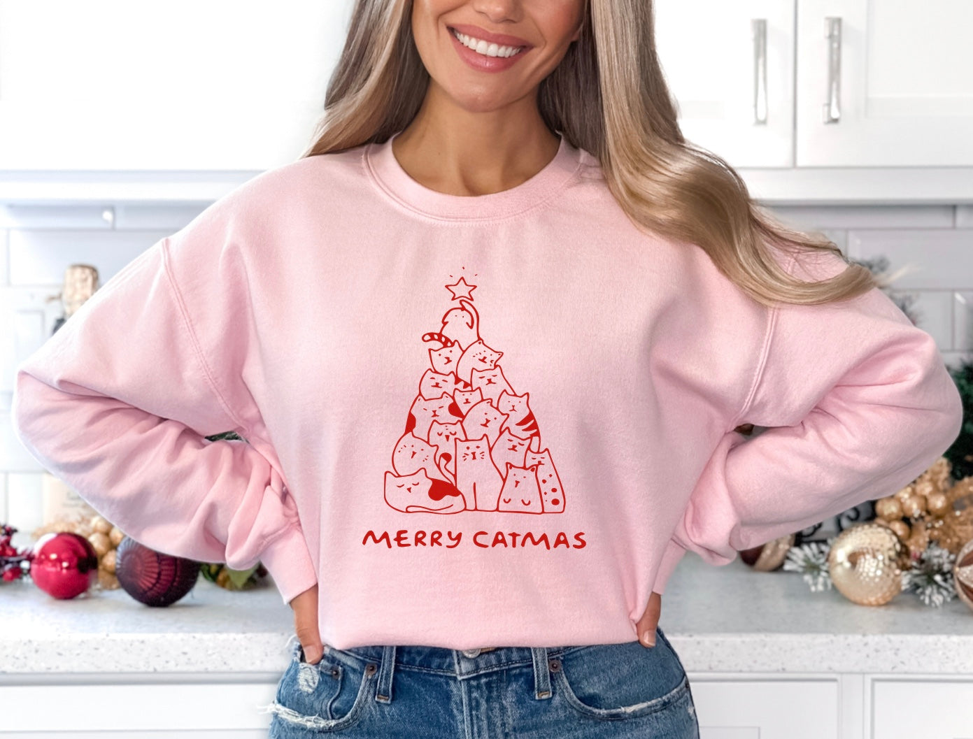 Merry Catmas unisex crewneck sweatshirt in pink with red graphic
