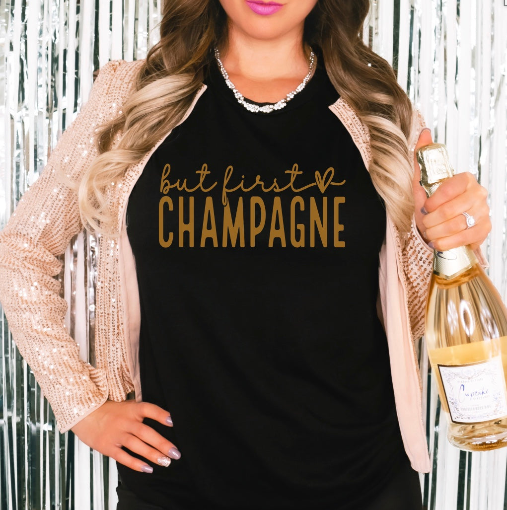 but first champagne unisex t-shirt in black with gold graphic
