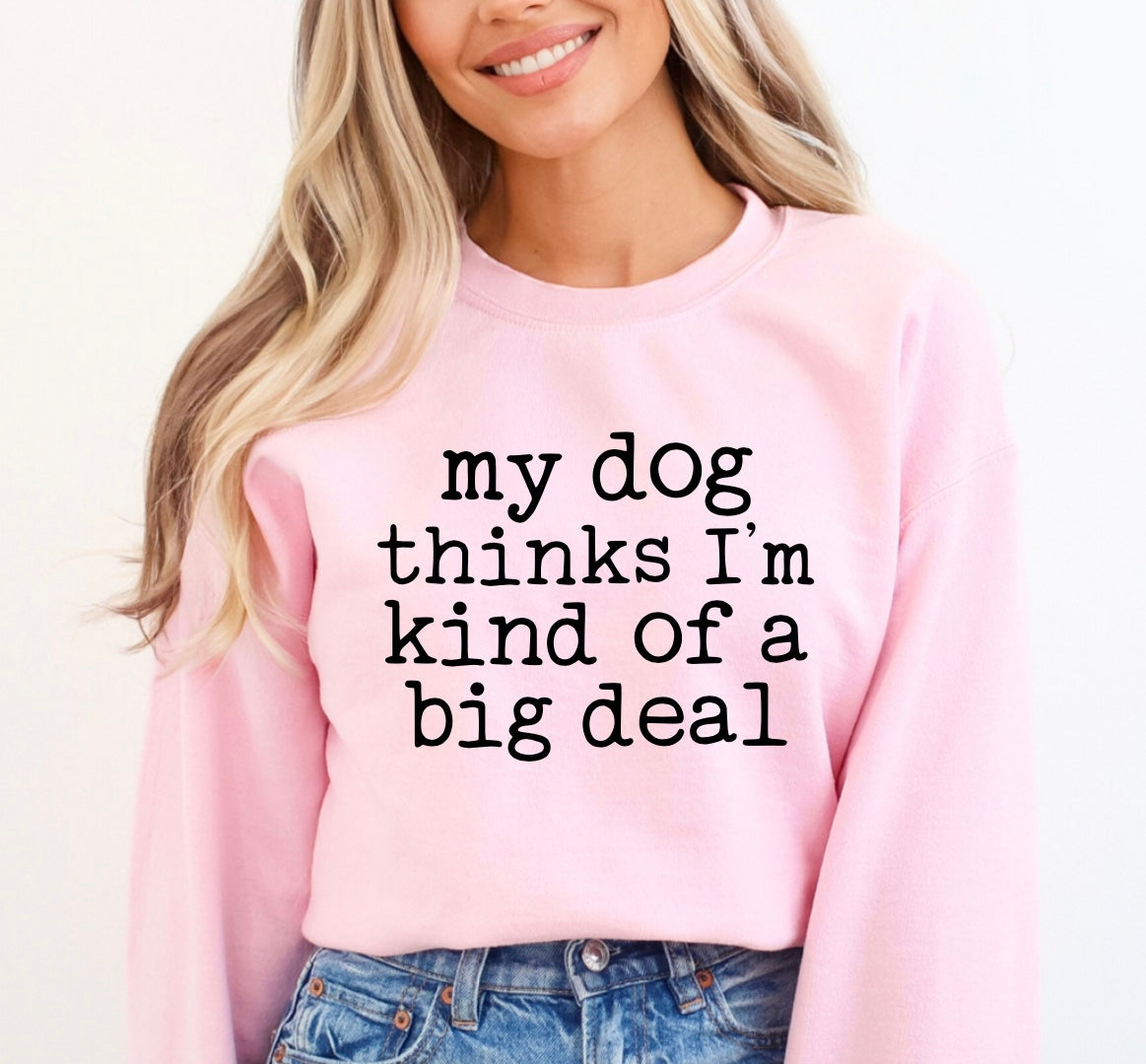 My dog thinks I’m kind of a big deal unisex crewneck sweatshirt in pink