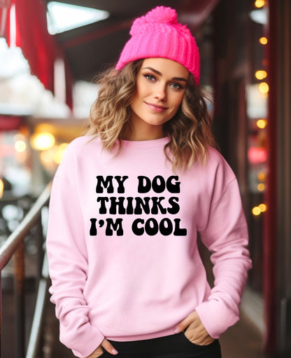 My dog thinks I’m cool unisex crewneck sweatshirt in pink