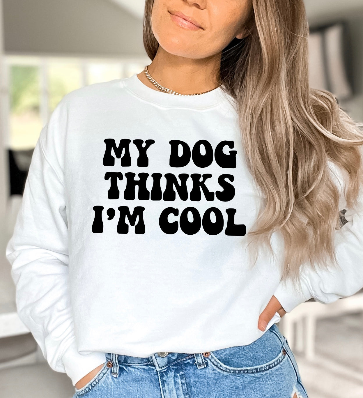 My dog thinks I’m cool unisex crewneck sweatshirt in white