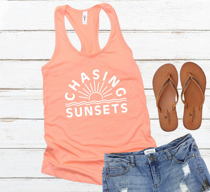 Chasing sunsets racerback tank top in orange with white graphic 