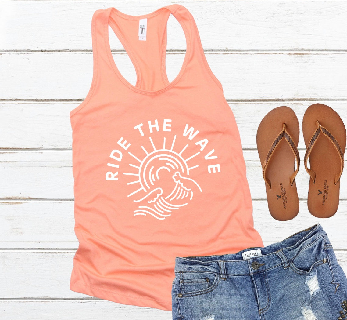 Ride the Wave racerback tank top in orange with white graphic 