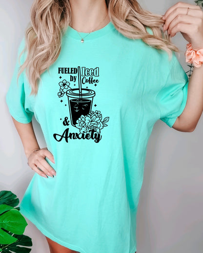 Fueled by iced coffee and anxiety comfort colors unisex t-shirt for women in island reef