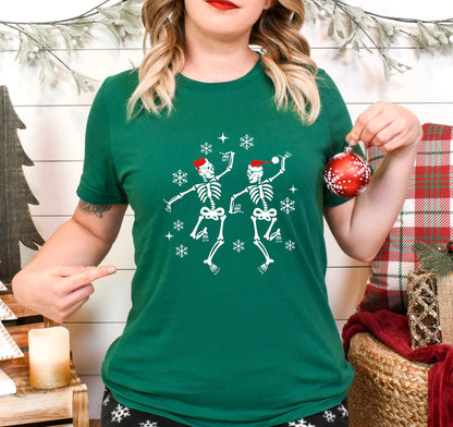 Dancing skeletons with Santa hats unisex Christmas t-shirt in green