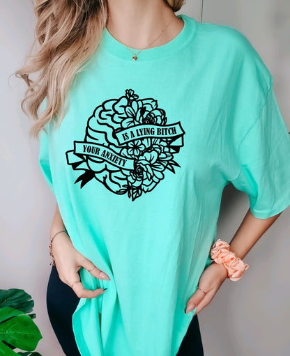 Your anxiety is a lying bitch comfort colors t-shirt with floral brain design in island reef