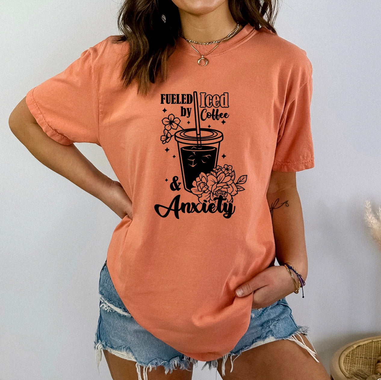 Fueled by iced coffee and anxiety comfort colors unisex t-shirt for women in terracotta 
