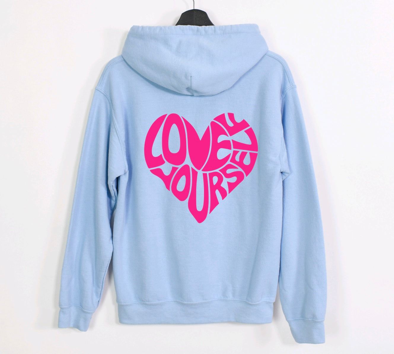 Love yourself unisex hoodie with sleeve design in paste with pink graphic 