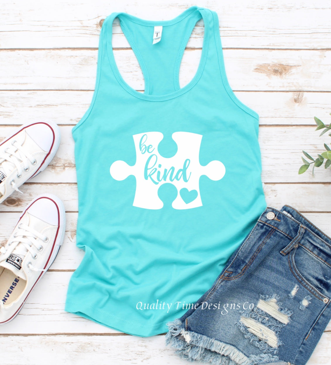 Be kind puzzle piece tank top