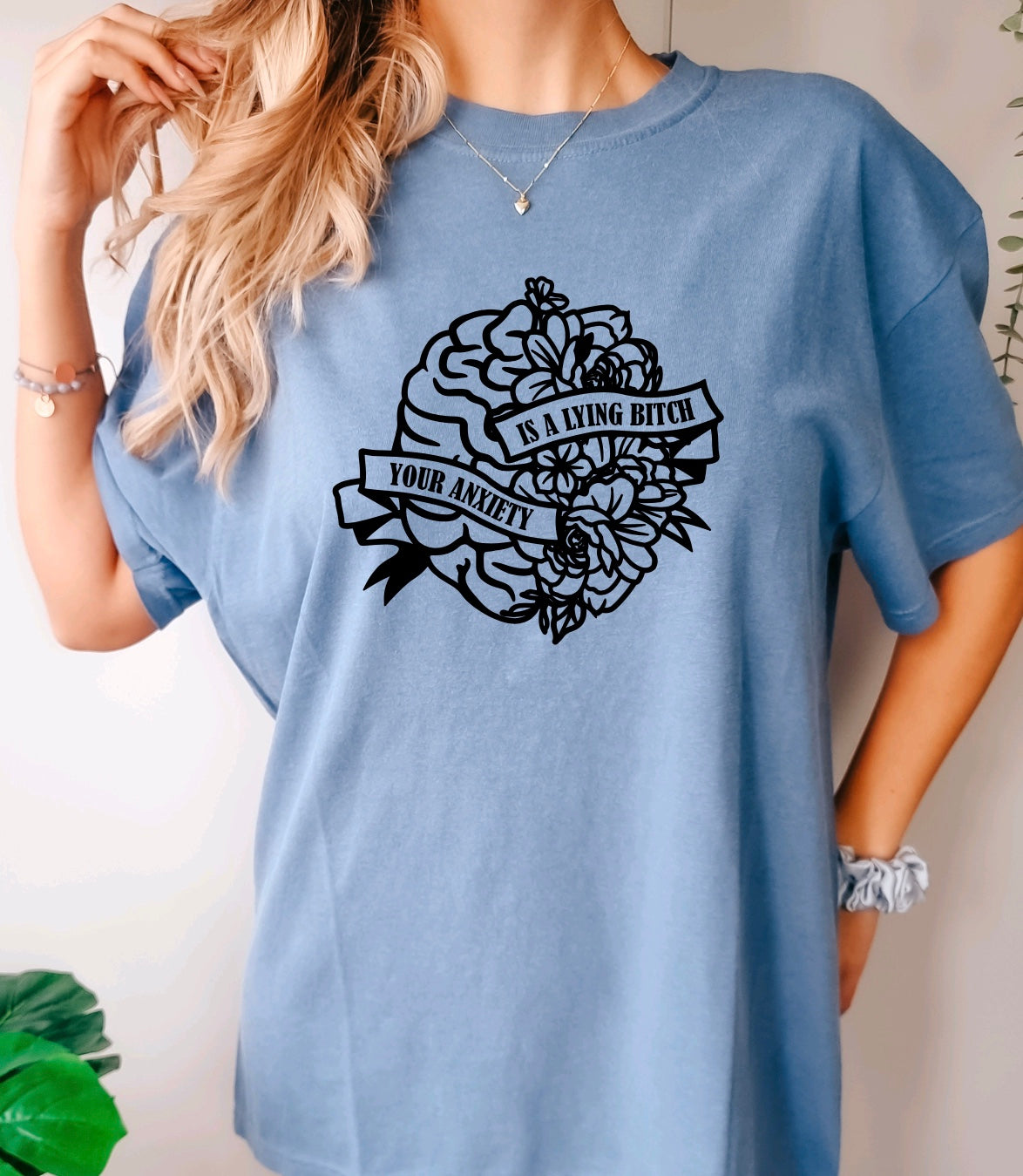 Your anxiety is a lying bitch comfort colors t-shirt with floral brain design in blue jean 